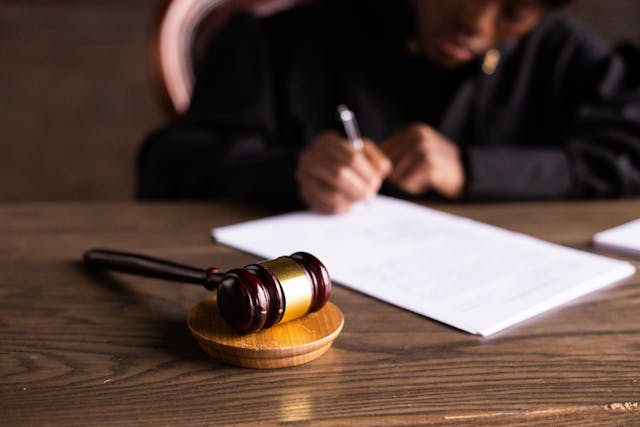 judge signing a document