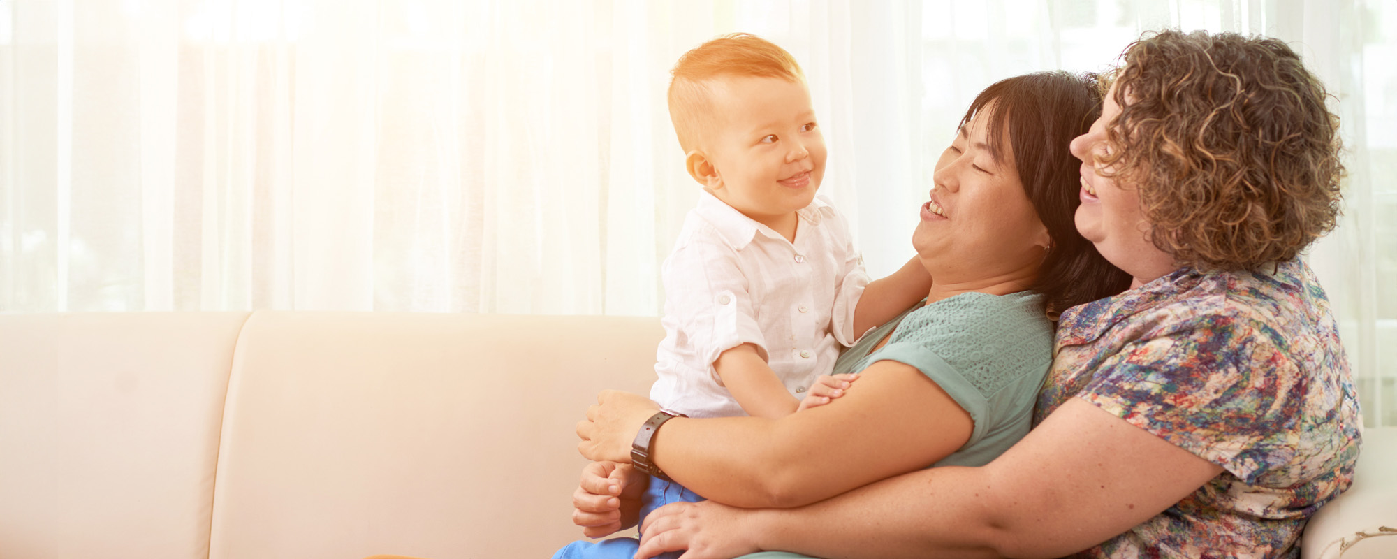 lgbtq couple with baby