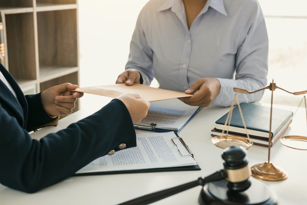 lawyer talking with client