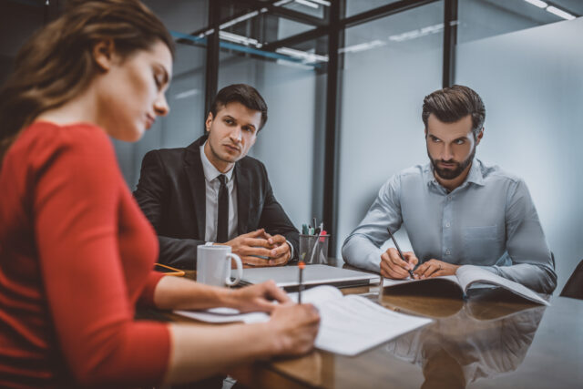 Man and woman writing a divorce request