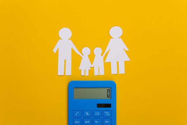 Paper happy family together with calculator on yellow background. Calculation of family expenses, budget